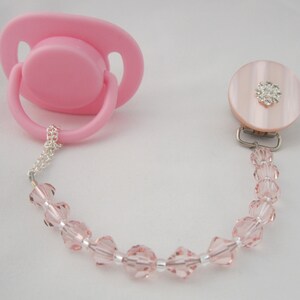 Clip per ciuccio rosa con cristalli europei (CSP)