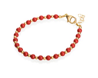 FAMA Red Coral Beaded Stretch Bracelet with Golden Paved Beads 