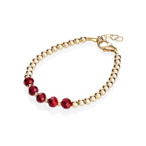 Conta dourada com pulseira central de cristal vermelho