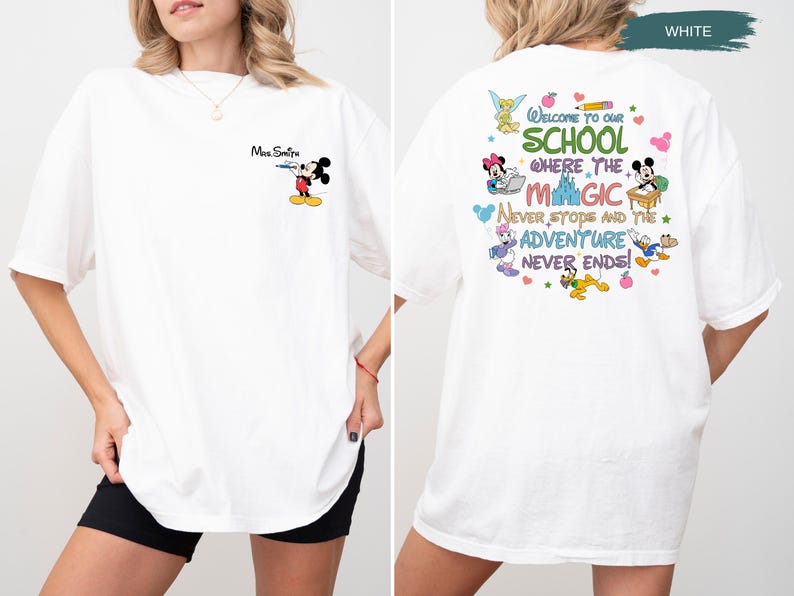 May include: White t-shirt featuring a Mickey Mouse graphic with the text "Mrs. Smith" on the front. The back of the shirt displays a colorful design with the text "Welcome to our school where the magic never stops and the adventure never ends!"