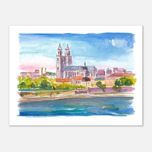 May include: Watercolor painting of a European cityscape featuring a large cathedral with two towers. The artwork showcases a river in the foreground, buildings with orange rooftops, and a blue and pink sky.