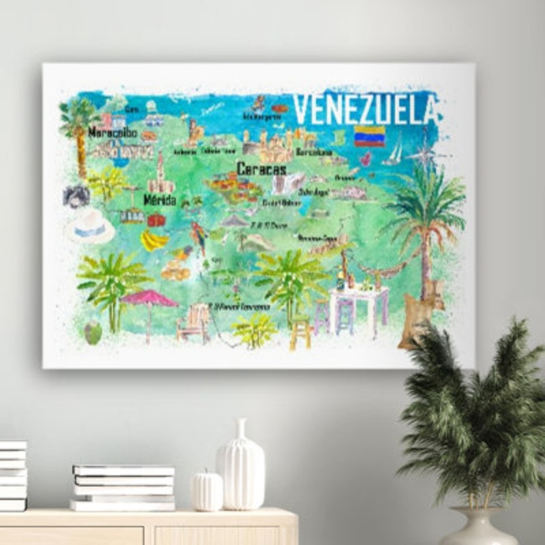 May include: A watercolor illustration of a map of Venezuela with the country name in bold letters. The map is decorated with palm trees, beaches, and other tropical imagery. The cities of Caracas, Merida, and Maracaibo are labeled on the map.
