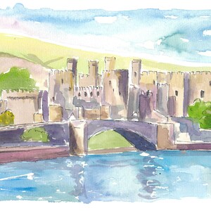 May include: Watercolour painting of a stone castle with a bridge over a river. The castle is set against a green hill and a blue sky with white clouds. The water in the river is a light blue colour.