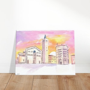 Peut inclure: Peinture à l'aquarelle d'une ville avec des bâtiments et une haute tour sur fond de ciel de coucher de soleil rose et orange.