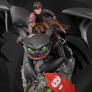 May include: A detailed figurine of a black dragon with green eyes and a red and white shield. A person is riding the dragon, holding a sword. The figurine is mounted on a rocky base, with a dark background.