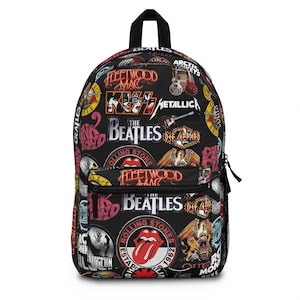May include: A black backpack featuring a multi-colored collage of various classic rock band logos and graphics, including The Beatles, Rolling Stones, Metallica, Fleetwood Mac, Kiss, and Def Leppard, with a front zippered pocket and black zippers.