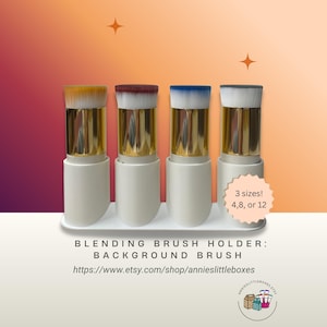 May include: Four blending brushes with white handles, gold ferrules, and colorful brush heads in yellow, burgundy, blue, and white. The brushes are displayed in a white holder. Text on the image reads "3 sizes! 4,8, or 12".