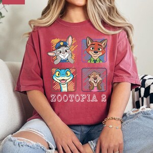 May include: A set of three ceramic mugs with a speckled, matte finish. The mugs are in cream, light grey, and dark grey. Each mug has a simple, minimalist design, ideal for coffee or tea.