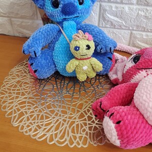 May include: A set of three ceramic mugs with a speckled, matte finish. The mugs are in shades of cream, light brown, and dark brown. Each mug has a simple, minimalist design, perfect for coffee or tea.