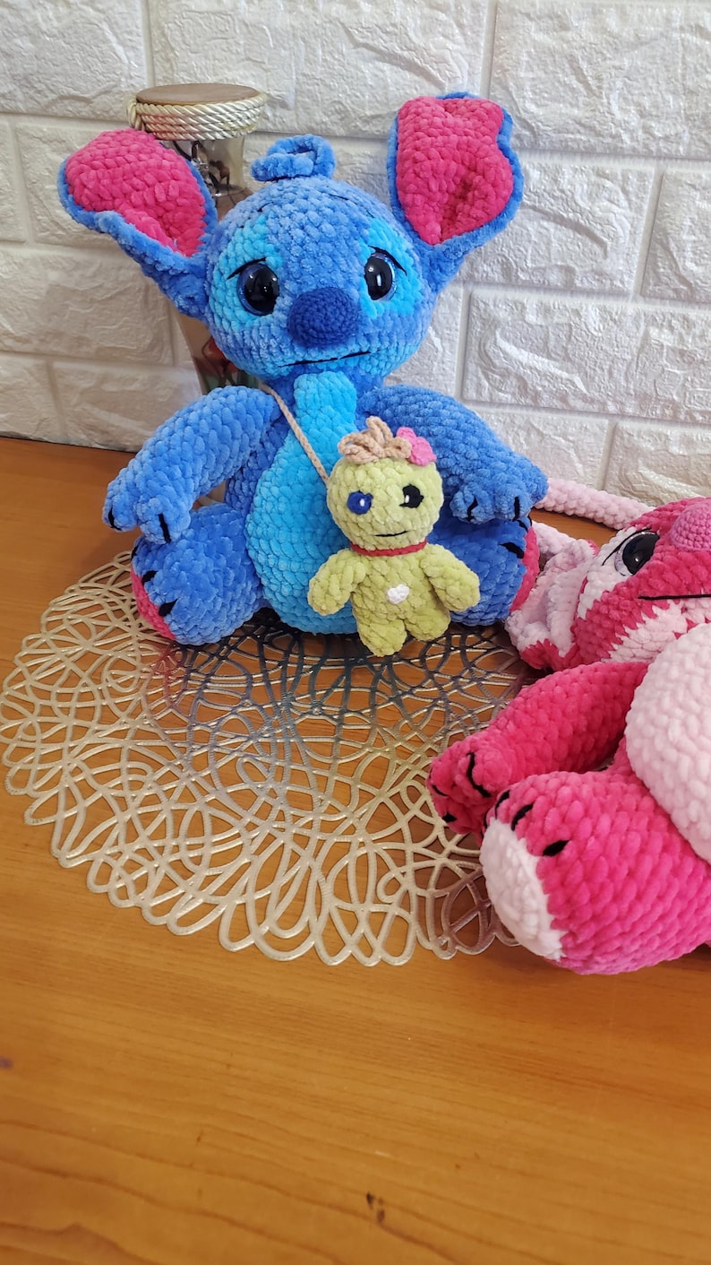 May include: A set of three ceramic mugs with a speckled, matte finish. The mugs are in shades of cream, light brown, and dark brown. Each mug has a simple, minimalist design, perfect for coffee or tea.