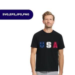 May include: A black short-sleeve t-shirt featuring the letters USA printed on the chest. The U is dark blue with pink stars, the S is white with black stars, and the A is dark red with pink stars. The text SVG, EPS, JPG, PNG appears above.