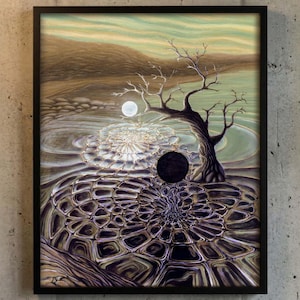 May include: Framed artwork featuring a surreal landscape with a leafless tree, a full moon, and a dark sphere. The artwork has a black frame and is displayed against a textured gray wall. The color palette includes shades of brown, green, and blue.