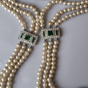 May include: A white ceramic mug with a black handle and the text "But First, Coffee" in a handwritten style. The mug is on a white surface. The mug is approximately 4 inches tall.