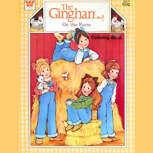 May include: A Whitman coloring book titled The Gingham On the Farm featuring an illustration of four children in blue overalls and plaid shirts playing in a hayloft with a small kitten and a mouse. The cover has a yellow gingham border.