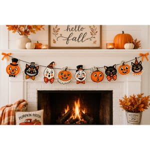 May include: A Halloween banner featuring a string of vintage-style cutouts including jack-o'-lanterns, black cats, a ghost, and a moon face, all accented with orange bows at each end, suspended across a white fireplace mantel.