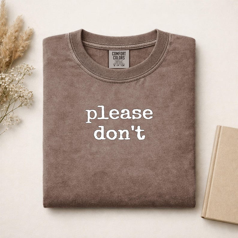 Brown Comfort Colors sweatshirt with "please don't" printed on front.
