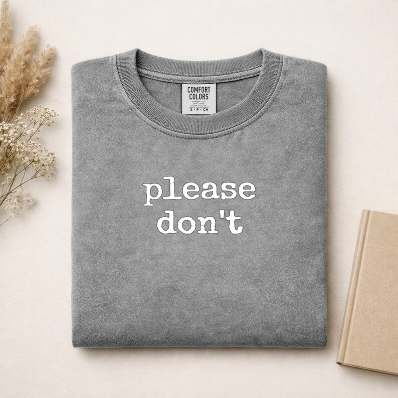 Gray Comfort Colors sweatshirt with "please don't" printed on chest.