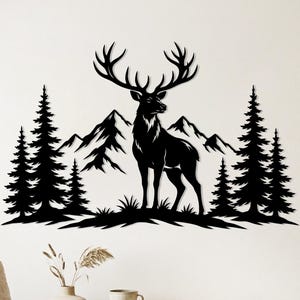 May include: Black metal wall art depicting a majestic deer with large antlers, standing in a forest scene. The silhouette includes pine trees and mountains, creating a nature-inspired design. This decorative piece is suitable for home decor.