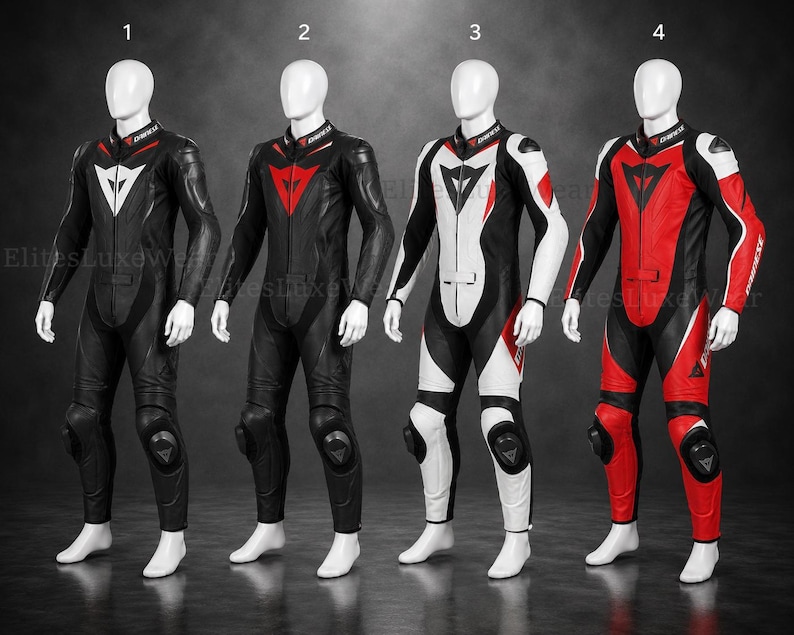 May include: Four motorcycle racing suits displayed on mannequins. The suits are black, red, and white, each featuring the "Dainese" logo on the collar. The suits have knee pads and are designed for protection. The colour schemes vary, with white, red, and black accents.