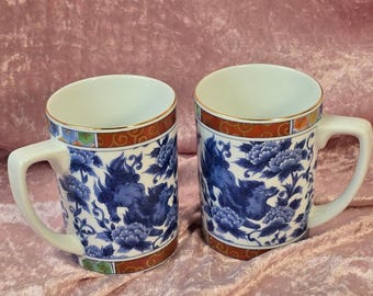 Vintage Japanese Imari Porcelain Foo Dog Mugs Blue White Gold Gilt Set of 2