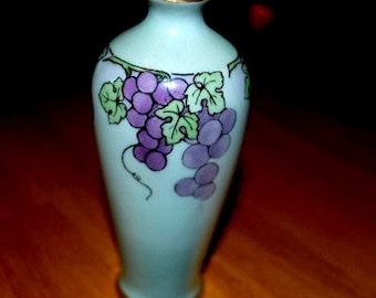 Purple and gold vase Grapevine motif a signed O and E Gutherz vase signed. old world art display vase