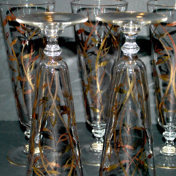 champagne flutes pilsner glasses Mad Men style gold and clear glass barware elegant glassware movie props