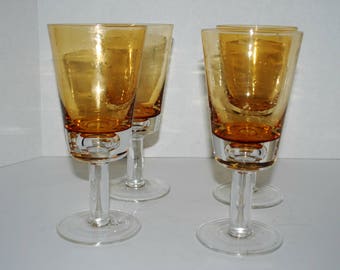 Tall amber and clear hand blown glasses  goblets drinking glasses cocktail glasses