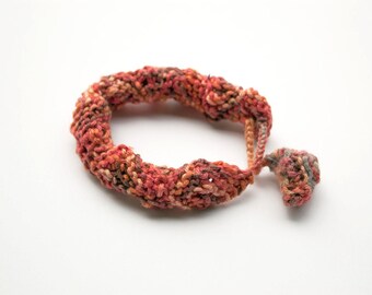 Knitted bracelet in orange OOAK fiber jewelry