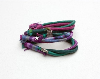 Friendship bracelet, fiber art jewelry, wrapped with metal charm and crocheted closing, emerald green blue, OOAK