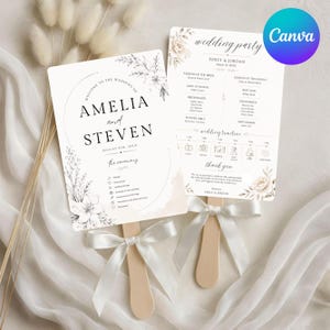 May include: Two white rectangular wedding program fans with wooden handles and white satin ribbons. The cards feature black text, floral illustrations, a wedding party list, and a timeline. One card displays the names Amelia and Steven.