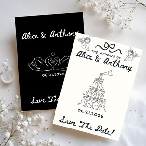 May include: Two wedding announcement cards. One is black with white text and a swan design. The other is off-white with black text and a champagne tower design. Both cards say "Alice & Anthony" and "Save The Date!"