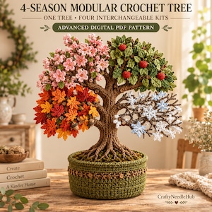 May include: A crochet tree with four distinct sections representing seasons: pink blossoms, green leaves with red apples, orange and yellow autumn leaves, and white snowflakes. The tree has a brown trunk and sits in a green crocheted pot. Text reads 4-SEASON MODULAR CROCHET TREE.