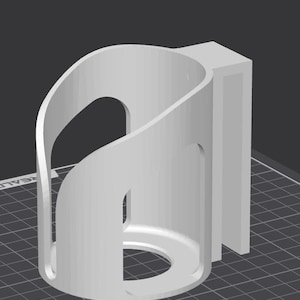 May include: A light gray, 3D-printed cylindrical cup holder with a curved, open-sided design and a flat, rectangular mounting bracket on the back. The structure features a circular base with a central cutout and smooth, rounded edges throughout.