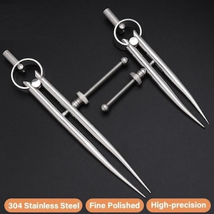 May include: Two silver-colored stainless steel wing dividers with pointed tips and adjustable threaded rods. The tools feature a circular head with a knurled adjustment nut. Text at the bottom reads: 304 Stainless Steel, Fine Polished, High-precision.
