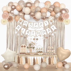 May include: A festive birthday party setup with a balloon arch in neutral tones, a banner reading "HAPPY BIRTHDAY", and a table laden with treats. Includes a star and heart-shaped balloon.
