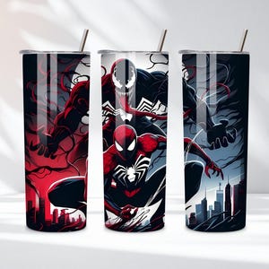 May include: Three stainless steel tumblers with superhero designs. The first features a red and black character, the second has Spider-Man, Venom, and a third character, and the third has a dark character with a city skyline.