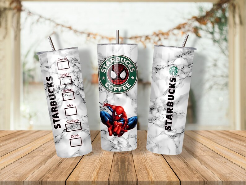 May include: Three Starbucks tumblers with a marble effect. One features the Starbucks logo with a Spider-Man graphic. The other two have the Starbucks logo and a drink customisation chart. Each tumbler has a silver straw.