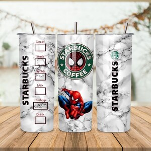 May include: Three stainless steel Starbucks tumblers with a marble design. One tumbler features the Starbucks logo and a Spider-Man graphic. The other two tumblers have the Starbucks logo and a section for drink customization.