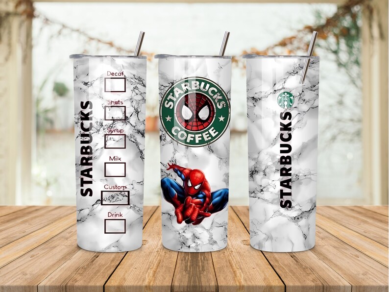 May include: Three Starbucks tumblers with a marble effect. One tumbler features the Starbucks logo with a Spider-Man graphic. The other two tumblers have the Starbucks logo and a section for drink customisation. Each tumbler has a silver straw.