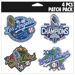 May include: A white ceramic mug with a black handle and the text "But First, Coffee" in a bold, black font. The mug is set against a blurred background, suggesting a cozy setting.