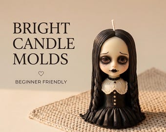 May include: A candle shaped like a doll with long black hair, large dark eyes, and a black dress with a white collar. The text BRIGHT CANDLE MOLDS and BEGINNER FRIENDLY is visible on the left side of the image next to the candle.