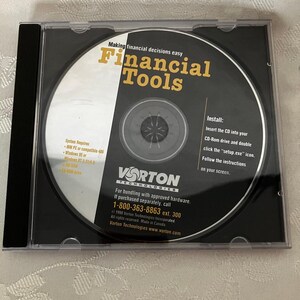 May include: A clear plastic CD jewel case containing a software disc titled Financial Tools by Vorton Technologies. The disc label is black and white with yellow text, featuring installation instructions, system requirements, and contact information.