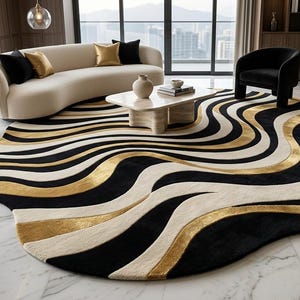 May include: An irregularly shaped area rug featuring a flowing, wavy pattern of black, cream, and metallic gold stripes. The rug has a soft, textured surface and covers a portion of the white marble floor, creating a bold visual contrast in the room.