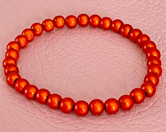 Orangefarbenes Armband mit 6 mm Perlen