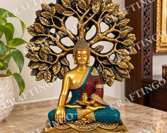 May include: A gold-toned Buddha statue in a meditative pose, seated before a large, circular, detailed tree with textured leaves. The figure wears a robe with a grid pattern in deep red and teal, accented with gold trim, resting on a rectangular base.