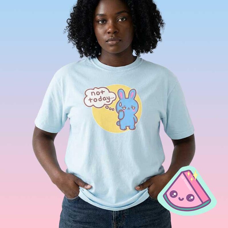 Woman wearing pastel blue funny bunny graphic t-shirt with “not today” text, cute sarcastic introvert shirt