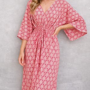 May include: A set of three ceramic mugs with a speckled, matte finish. The mugs are in shades of cream, light gray, and dark gray. Each mug has a simple, minimalist design, perfect for coffee or tea.