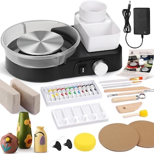 May include: A black pottery wheel kit with a silver spinning surface, white containers, and a variety of art supplies. Includes paint tubes, brushes, pottery tools, clay, and decorative vases. A complete set for pottery enthusiasts.
