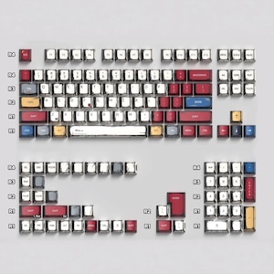 May include: A set of mechanical keyboard keycaps in various colours, including red, blue, yellow, and white. The keycaps are arranged in rows and columns, with function keys and letters visible. The layout is designed for a standard keyboard.