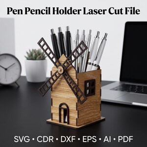May include: A wooden pen and pencil holder shaped like a windmill with a rotating blade assembly, containing several black and silver pens. The text Pen Pencil Holder Laser Cut File and SVG CDR DXF EPS AI PDF are visible in the image.